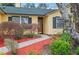 Close-up of home showcasing a charming front door, manicured landscaping, and a well-maintained facade at 1113 Lyric Dr, Deltona, FL 32738