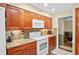 Bright kitchen showcasing ample cabinetry, granite counters, and modern appliances at 1113 Lyric Dr, Deltona, FL 32738