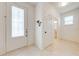 Entryway featuring a tiled floor and view into a bathroom through a doorway at 11604 Acosta Ave, Orlando, FL 32836