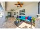 Relaxing covered patio with comfortable seating, perfect for enjoying the outdoors at 11604 Acosta Ave, Orlando, FL 32836