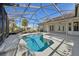 Inviting pool with a spa, screened-in for year-round enjoyment at 12018 Se 175Th Loop, Summerfield, FL 34491