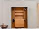 Walk-in closet features shelving and drawers for organized storage at 13336 Lake Turnberry Cir, Orlando, FL 32828