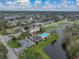 Enjoy this community pool and playground; near a pond with fountain, surrounded by many beautiful homes at 1385 Evergreen Park Cir, Lakeland, FL 33813