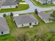 Aerial view of the house showcasing its backyard, and proximity to neighboring homes at 1385 Evergreen Park Cir, Lakeland, FL 33813