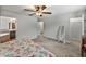 Bright bedroom shows ensuite bath, closet, and lots of space at 1385 Evergreen Park Cir, Lakeland, FL 33813