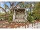 Cozy backyard space featuring a shaded hammock structure perfect for relaxing outdoors at 142 Habersham Dr, Longwood, FL 32779