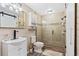 Bathroom featuring a stylish vanity and a large tiled shower with glass door at 142 Habersham Dr, Longwood, FL 32779