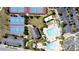 Overhead aerial shot of community amenities with tennis and basketball courts, and swimming pools at 14434 Swanley St, Orlando, FL 32832