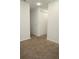 Neutral bedroom showcasing carpeted floors and a double door closet at 14434 Swanley St, Orlando, FL 32832