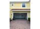 Spacious garage with brick-paved driveway, offering ample parking and storage space at 14434 Swanley St, Orlando, FL 32832