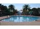 Community swimming pool with colorful water features, perfect for Gathering fun and recreation at 14434 Swanley St, Orlando, FL 32832