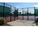 Well-maintained tennis court with secure fencing, providing a great space for active recreation at 14434 Swanley St, Orlando, FL 32832