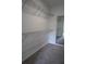 Walk-in closet offers carpeted floors, a full length mirror, and wire shelving at 14434 Swanley St, Orlando, FL 32832