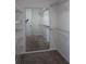 Walk-in closet features carpeted floors, a full length mirror, and wire shelving at 14434 Swanley St, Orlando, FL 32832