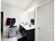 Well-lit bathroom with double vanity sinks, a large mirror, and contemporary fixtures at 15127 Book Club Rd, Winter Garden, FL 34787