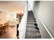 Carpeted staircase leading to the second floor, showcasing open living space at 15127 Book Club Rd, Winter Garden, FL 34787