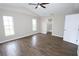 Large bedroom features hard wood floors and three windows providing lots of natural light at 1721 Sandalwood Sw Cir, Winter Haven, FL 33880