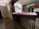 Kitchen featuring an island with a sink, white countertops and cabinets, with stainless steel appliances at 1721 Sandalwood Sw Cir, Winter Haven, FL 33880