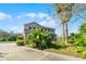 Charming home with a two-car driveway, mature landscaping and blue shutters at 2040 Touchwood Ct, Apopka, FL 32712