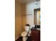 A bathroom with a wood vanity and mirror, toilet and towel rack at 2047 Dixie Belle Dr # 2047K, Orlando, FL 32812