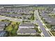 Wide aerial shot showing a residential neighborhood featuring well-maintained streets and manicured lawns at 2348 Clemblue Rd, Clermont, FL 34715