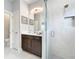 Beautiful bathroom with large glass shower, and modern vanity, and a toilet room at 2348 Clemblue Rd, Clermont, FL 34715