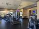 Well-maintained fitness center featuring weight machines, treadmills, and TVs at 2348 Clemblue Rd, Clermont, FL 34715