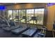 Bright fitness center with treadmills, elliptical machines, and a rowing machine at 2348 Clemblue Rd, Clermont, FL 34715