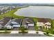 Aerial view of the homes with 3-car garages near the lake at 2930 Wordsmith Rd, Kissimmee, FL 34746