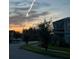 Street view of a two-story home at sunset at 2930 Wordsmith Rd, Kissimmee, FL 34746