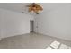 A light and airy bedroom featuring a ceiling fan and plank flooring at 3000 Stonington Run, Kissimmee, FL 34746