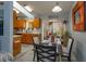 Bright dining area adjacent to the kitchen, perfect for casual meals and entertaining at 30113 Robin Ln, Tavares, FL 32778