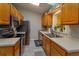 Functional kitchen featuring modern appliances, ample counter space, and natural light at 30113 Robin Ln, Tavares, FL 32778