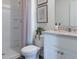 Comfortable bathroom with shower, toilet and vanity offers a relaxing space at 3166 Partington Blvd, Davenport, FL 33837