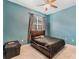 Bedroom featuring a large window and dark walls at 3320 Ashmount Dr, Orlando, FL 32828