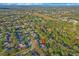 Overhead view of a charming home on a verdant, tree-lined street in a well-established neighborhood at 3443 Players Point Loop, Apopka, FL 32712