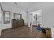 Bright hallway showcasing decorative mirror and a bathroom entrance at 3443 Players Point Loop, Apopka, FL 32712