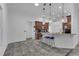 Kitchen with breakfast bar, pendant lights, and stainless steel appliances at 3443 Players Point Loop, Apopka, FL 32712