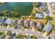 An aerial view shows the home's location on a well maintained street with a pond view at 3722 Madbury Cir, Lakeland, FL 33810