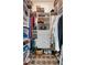 Neatly organized walk-in closet provides ample storage with custom shelving and drawers at 4068 Stone Creek Loop, Lake Wales, FL 33859