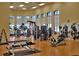 Spacious gym with state-of-the-art equipment and large windows, promoting a healthy lifestyle for residents at 4068 Stone Creek Loop, Lake Wales, FL 33859