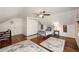 Charming bedroom with hardwood floors, rustic rugs, and bright overhead lighting at 415 W Rich Ave, Deland, FL 32720