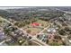 This aerial showcases the property location within a community, near a church with ample parking at 4431 Clubhouse Rd, Lakeland, FL 33812