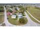 An aerial shot shows the property layout, landscaping, and surrounding neighborhood streets at 4431 Clubhouse Rd, Lakeland, FL 33812