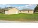 View of home exterior showing the well-maintained lawn at 4431 Clubhouse Rd, Lakeland, FL 33812