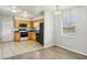 Close-up of kitchen, highlighting wood cabinets, black appliances, and updated finishes at 4431 Clubhouse Rd, Lakeland, FL 33812