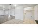 Well-lit laundry room with tiled floor and washer/dryer hookups, conveniently located near the living area at 4431 Clubhouse Rd, Lakeland, FL 33812