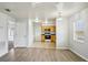 Open concept living room with eat in kitchen and modern flooring at 4431 Clubhouse Rd, Lakeland, FL 33812