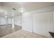 Open-concept living room featuring both tile and wood flooring, creating a modern and inviting atmosphere at 4431 Clubhouse Rd, Lakeland, FL 33812