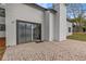 Outdoor patio area perfect for enjoying the outdoors, featuring a sliding glass door entrance at 4940 Spring Run Ave, Orlando, FL 32819